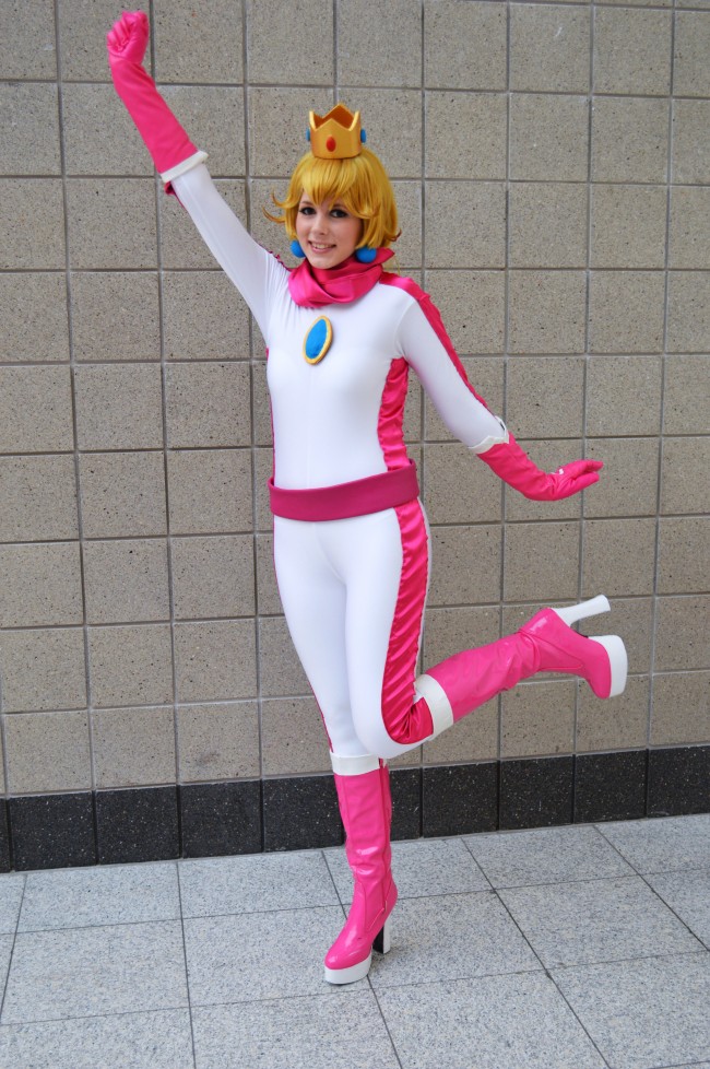 Peachy Cosplay. there’s no question who her favorite racer is from Mario Ka...