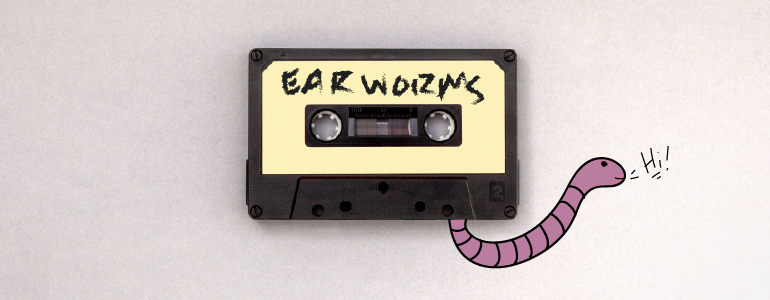 Earworm crawling from a cassette tape.